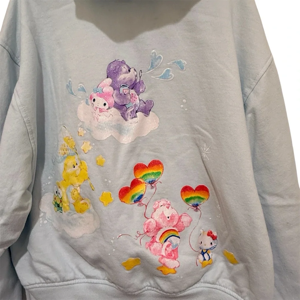 Hello Kitty x Care‎ Bear Collab Hoodie in Light Blue Pride. Junior XS